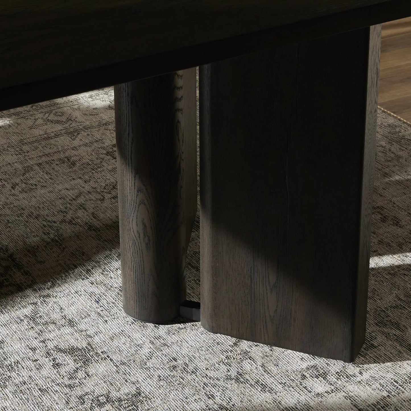 010 SI-2320129 | Closeup | Huxley Dining Table by Four Hands in smoked black veneer. Made from thick oak veneer, solid oak in a unique style.