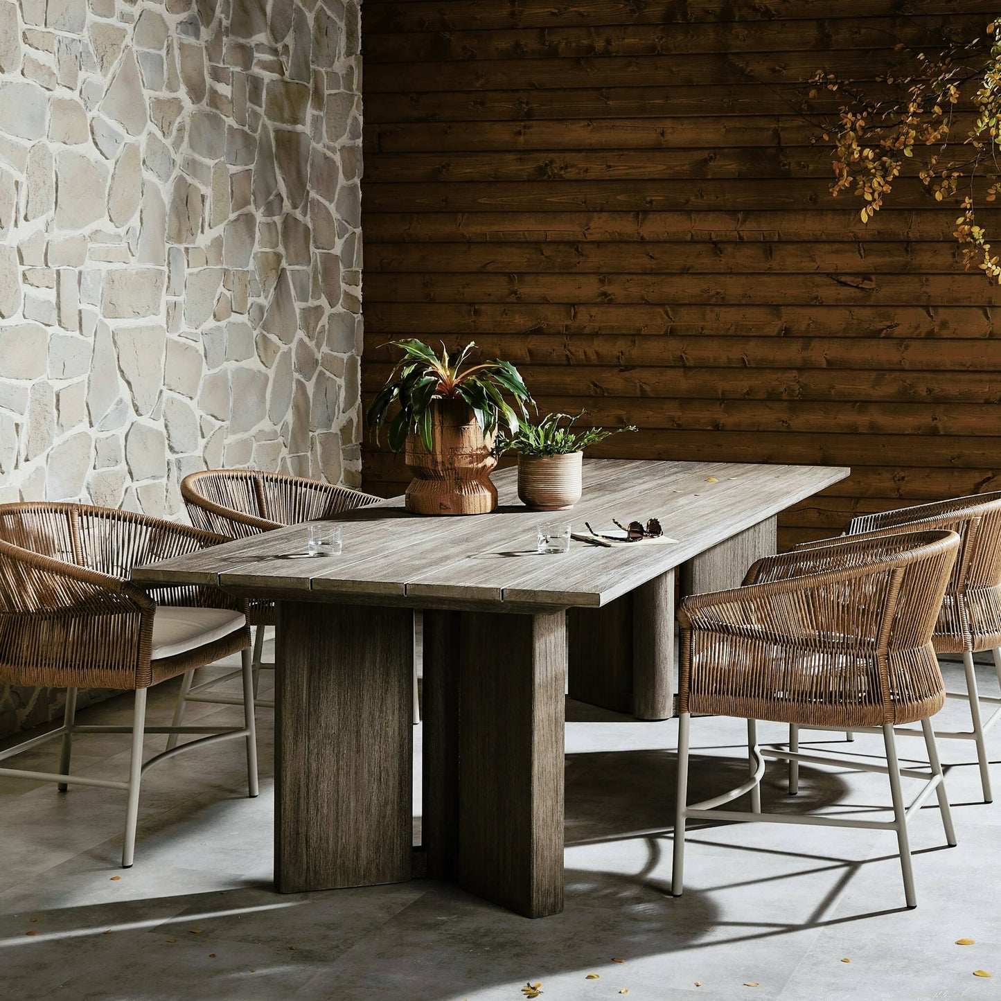 013 SI-2158207 | Lifestyle | Huxley Outdoor Dining Table 110" by Four Hands in smoke grey. Made from solid fsc®-certified teak in a modern style.