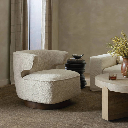Dottie Swivel Chair by Four Hands in berber oatmeal, almond. Made from 71%li-13, 5%wo-9, 5%vi-6%pl, solid parawood in a transitional style.