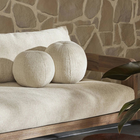 Balle Outdoor Pillow by Four Hands in leto cream. Made from 86% recycled olefin, 9% polypropylene, 5% polyester in a modern style.