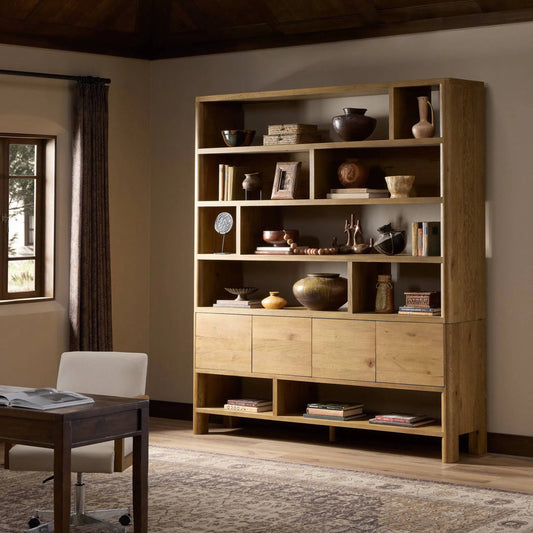 Noeline Wide Bookcase by Four Hands in worn oak, resawn worn oak. Made from solid oak, resawn oak veneer in a transitional style.