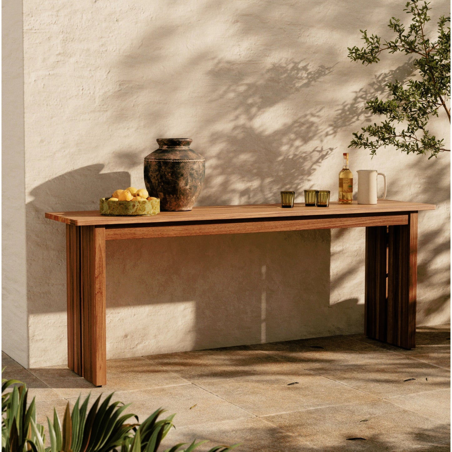013 SI-2158108 | Lifestyle | Chapman Outdoor Console Table by Four Hands in natural teak. Made from solid fsc®-certified teak in a modern style.