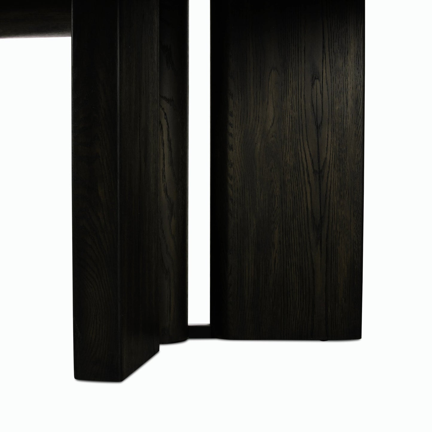007 SI-2158206 | Closeup | Huxley Dining Table 84" by Four Hands in smoked black veneer. Made from thick oak veneer, solid oak in a modern style.