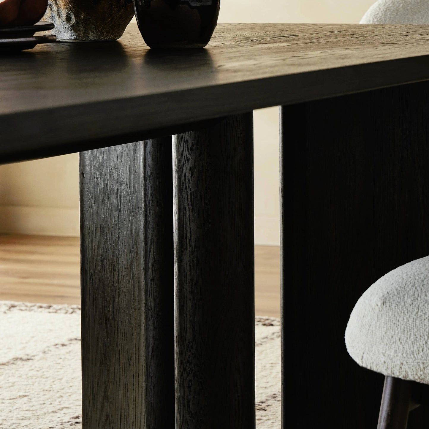 010 SI-2158206 | Closeup | Huxley Dining Table 84" by Four Hands in smoked black veneer. Made from thick oak veneer, solid oak in a modern style.