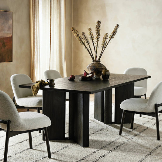 Huxley Dining Table 84" by Four Hands in smoked black veneer. Made from thick oak veneer, solid oak in a modern style.