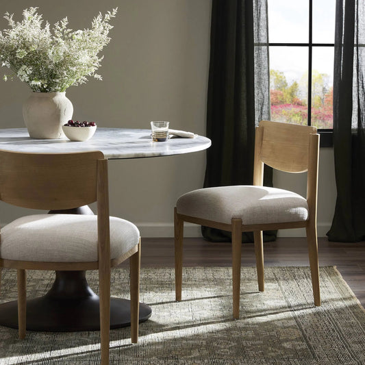 Piran Dining Chair by Four Hands in essence natural, natural nettlewood, natural ash veneer. Made from 49% viscose (rayon), 22% flax/linen, 18% polyester, 11% cotton, solid nettlewood, ash veneer in a unique style.