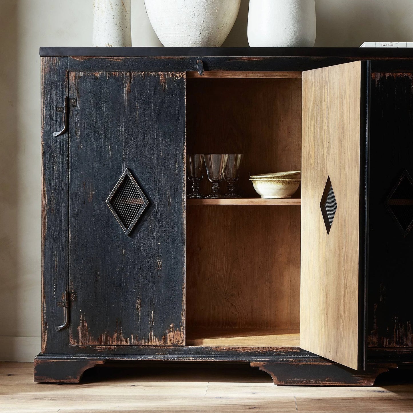 009 SI-2137641 | Closeup | The Humptulips River Moonshine Cabinet by Four Hands in distressed burnt black. Made from pine veneer, solid pine in a modern style.