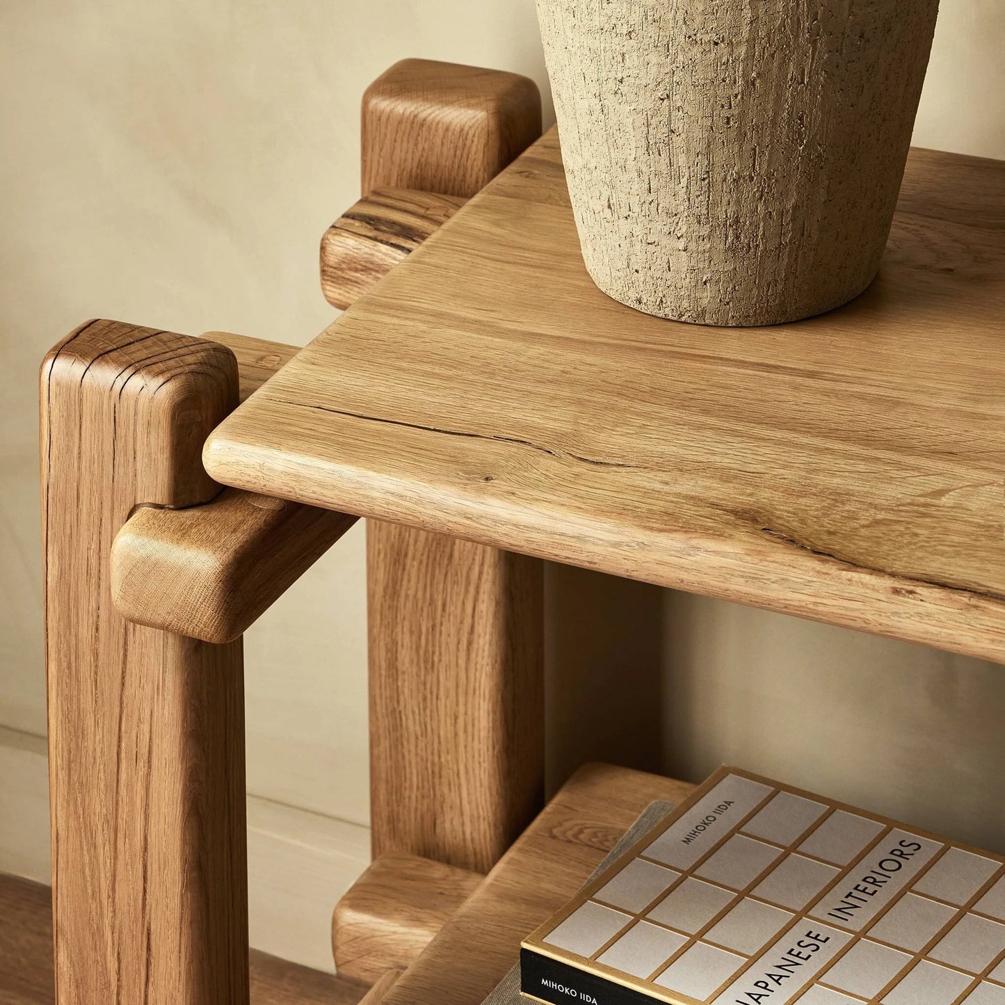 010 SI-2137486 | Closeup | Marcia Low Console Table by Four Hands in natural reclaimed french oak. Made from solid reclaimed oak in a modern style.