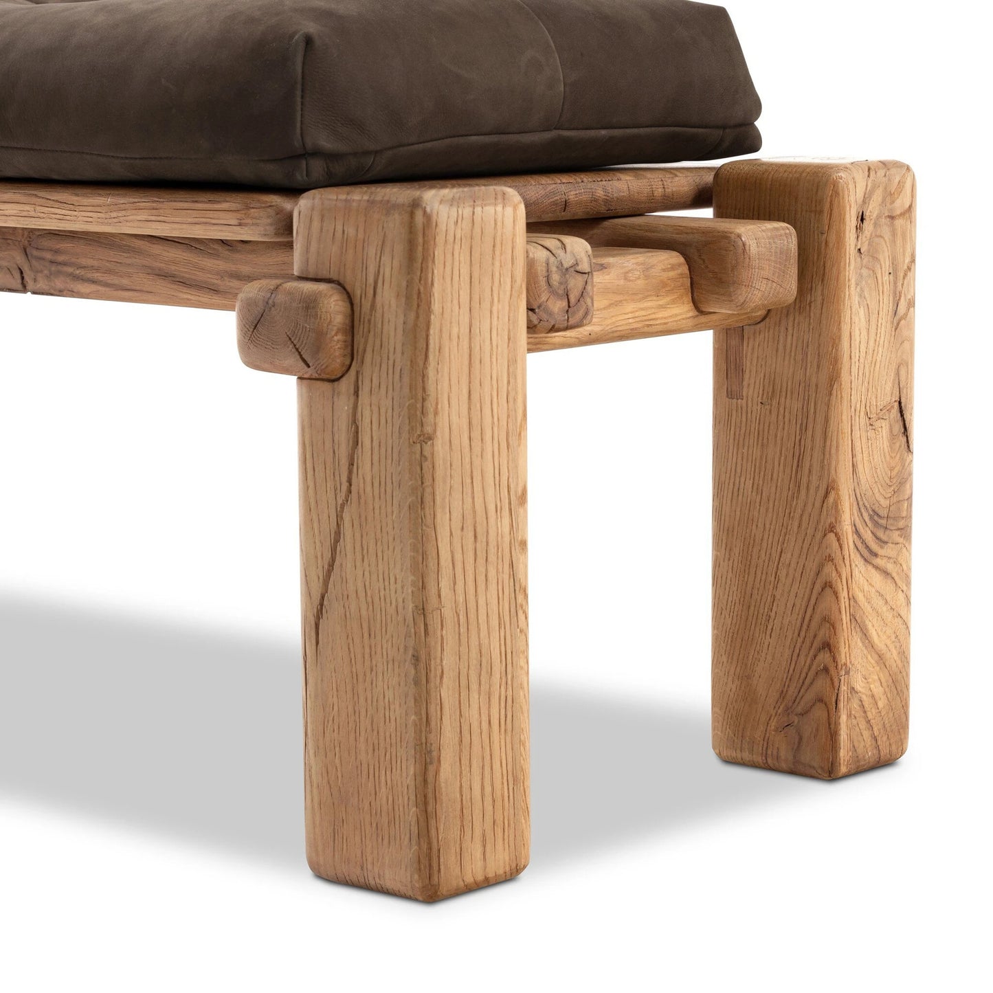 006 SI-2137481 | Closeup | Marcia Accent Bench by Four Hands in nubuck cigar and natural reclaimed french oak. Made from top grain leather, solid reclaimed oak, 95% polyurethane foam, 5% fiber in a modern style.