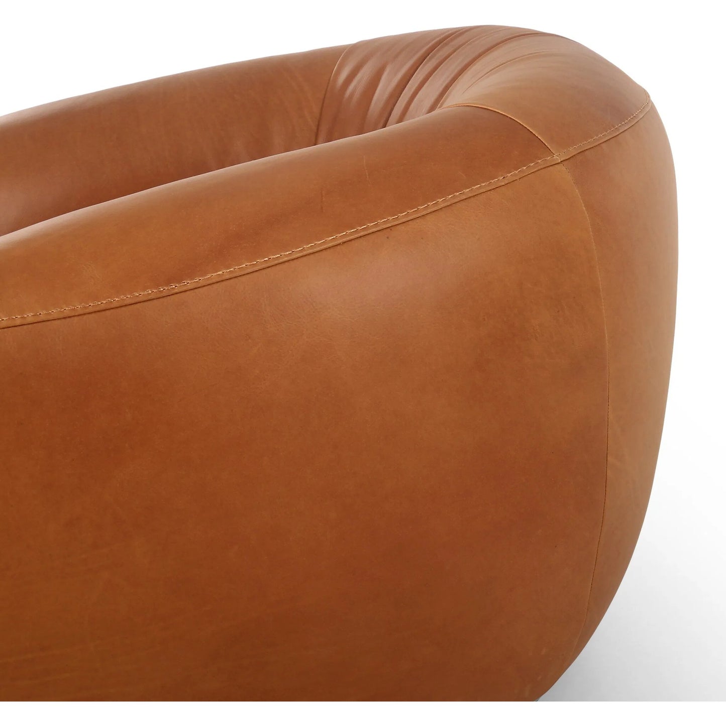 006 SI-2449410 | Closeup | Saldana Swivel Chair by Four Hands in lorento cognac. Made from top grain leather in a unique style.