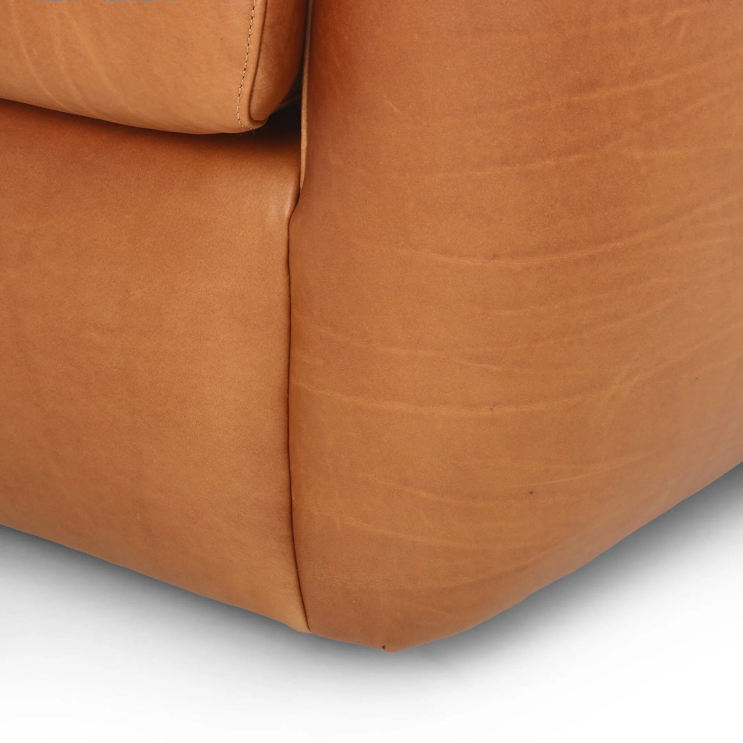 007 SI-2449410 | Closeup | Saldana Swivel Chair by Four Hands in lorento cognac. Made from top grain leather in a unique style.