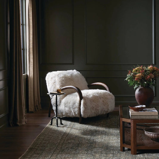 Sandro Chair by Four Hands in champagne mongolian fur, almond. Made from 100% wool fur, solid parawood in a modern style.