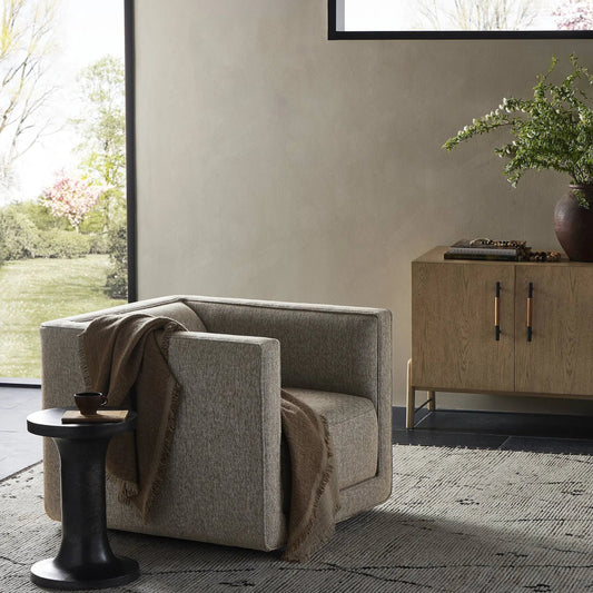 Phillip Swivel Chair by Four Hands. Made from unique in a traditional style.