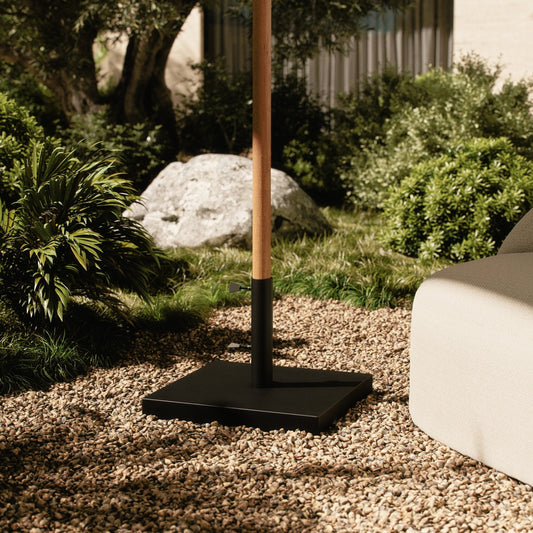 Baska Outdoor Umbrella Stand by Four Hands in black stainless steel. Made from stainless steel in a modern style.