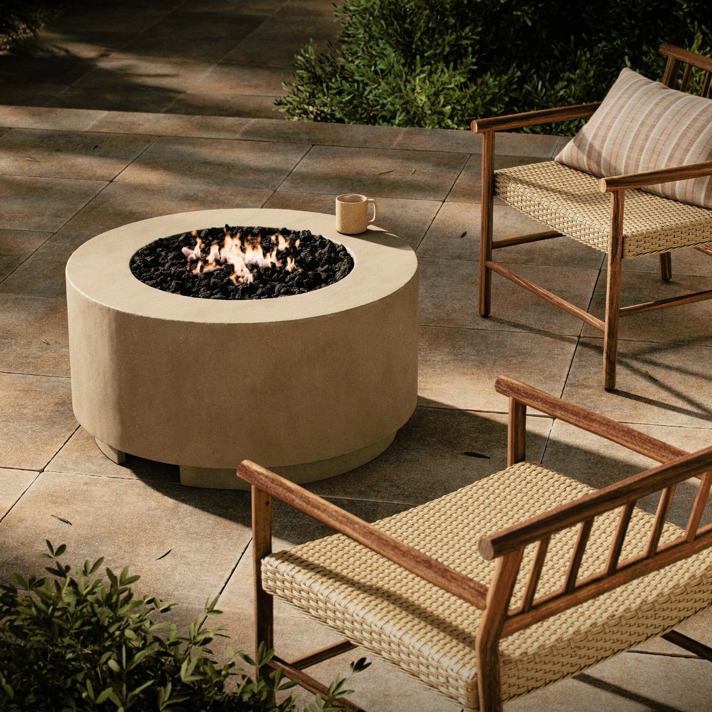 011 SI-2158131,SI-2158134 | Lifestyle | Damian Outdoor Fire Table by Four Hands. Made from concrete in a modern style.