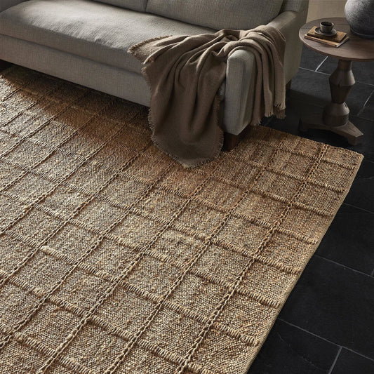 Grid Jute Rug by Four Hands in natural grid jute. Made from 100% jute in a unique style.