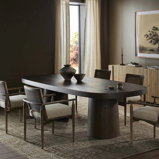 Valen Dining Table by Four Hands in rustic brown oak veneer. Made from oak veneer in a unique style.