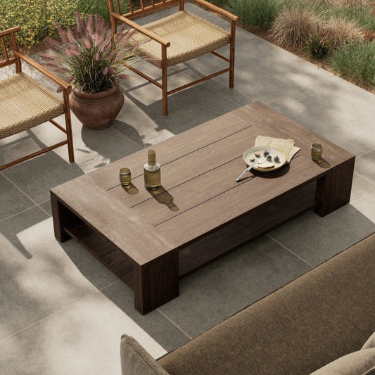 Roca Outdoor Coffee Table by Four Hands in stained heritage brown-fsc. Made from solid fsc® reclaimed teak in a transitional style.