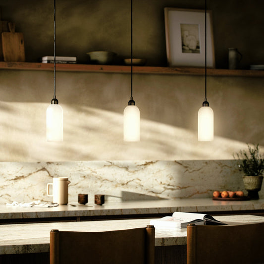 Odyssey Single Pendant by Four Hands in opal matte glass. Made from glass, thermoplastic, brass in a modern style.