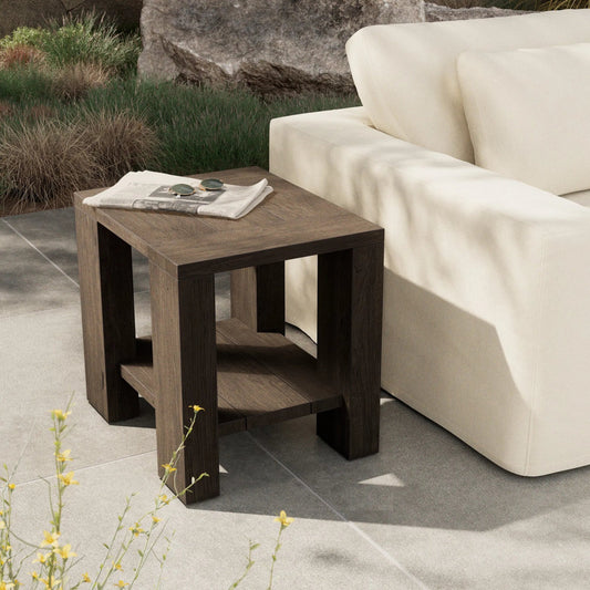 Roca Outdoor End Table by Four Hands in stained heritage brown-fsc. Made from solid fsc®-reclaimed teak in a transitional style.