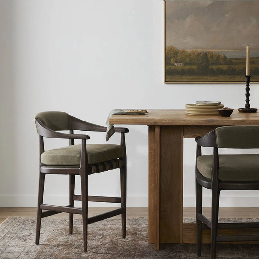 Dane Counter Stool by Four Hands in broadway olive, terra brown oak. Made from 100% flax/linen, solid oak in a traditional style.