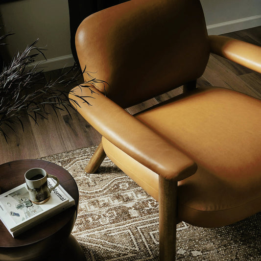 Eisley Chair by Four Hands. Made from top grain leather, solid parawood, poplar plywood in a modern style.