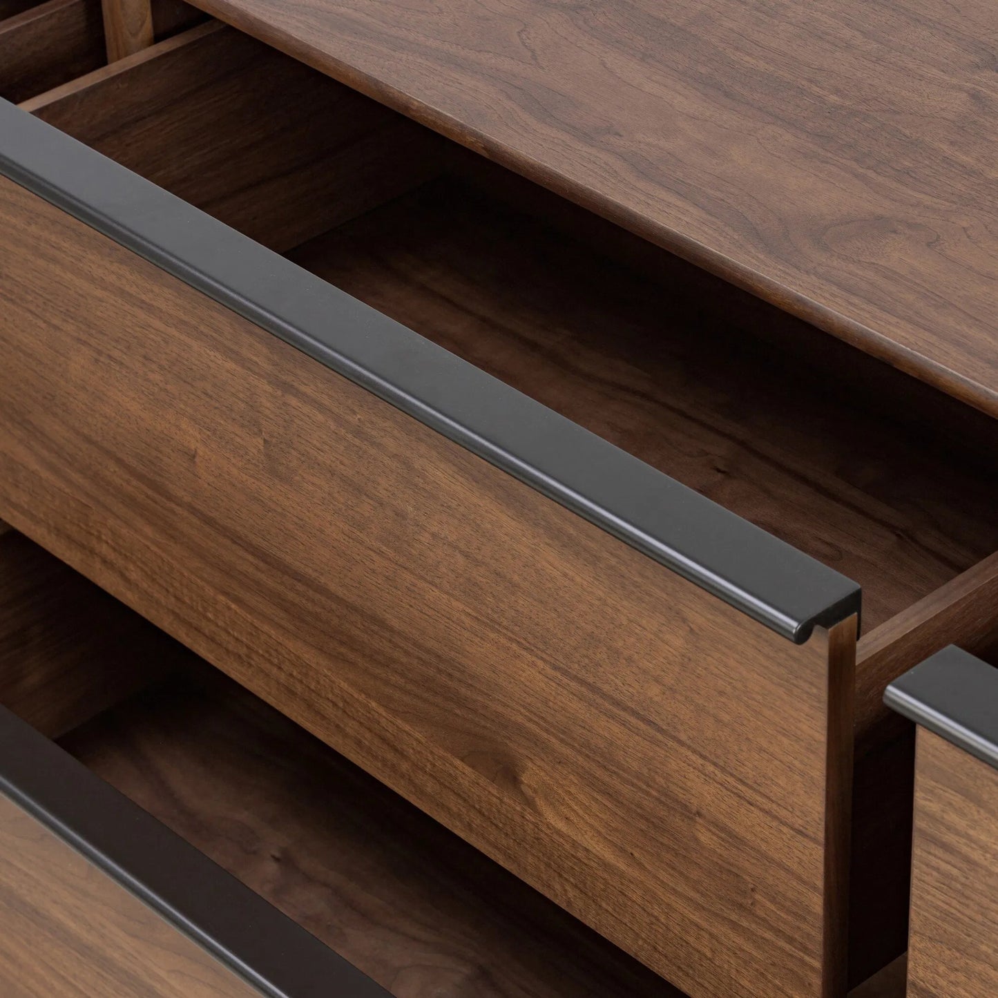 012 SI-2446652 | Closeup | Theo 6 Drawer Dresser by Four Hands in dark brown walnut, dark brown walnut veneer. Made from solid walnut, walnut veneer in a unique style.