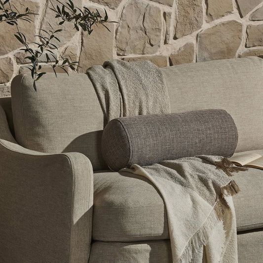 Hargrove Outdoor Bolster Pillow by Four Hands in ambro stripe. Made from 100% polypropylene in a transitional style.