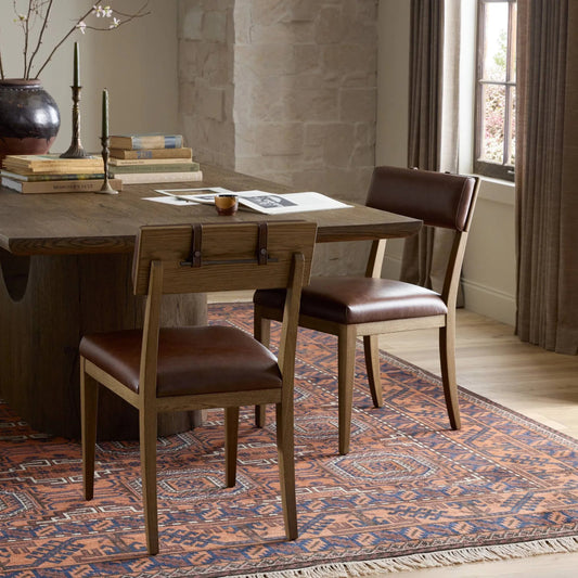 Marcello Dining Chair by Four Hands in havana brown, toasted oak, gris gunmetal. Made from top grain leather, solid oak, iron in a traditional style.