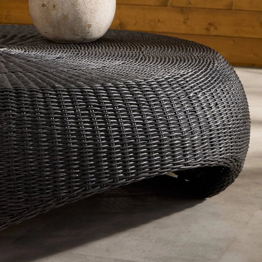 Brock Outdoor Coffee Table by Four Hands. Made from 100% polyethylene in a rustic style.