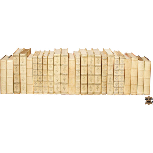 001 S-242775 | Primary Silo | White Leather Paper Books by Sarreid Ltd. in ivory and assorted stitched closed. Made from leather in a cottage & farmhouse style.