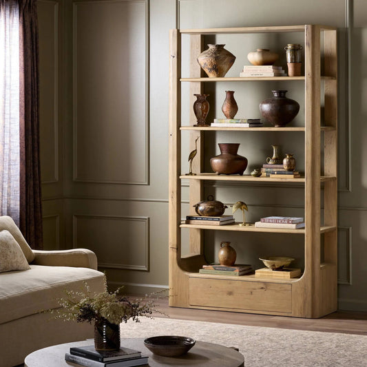 Lloyd Bookcase by Four Hands in aged natural oak veneer. Made from thick oak veneer, solid oak in a transitional style.