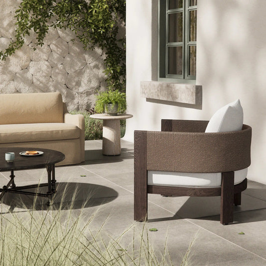 Delancy Outdoor Chair by Four Hands in arashi salt, stained saddle brown-fsc, tanned weave. Made from 100% acrylic, solid fsc®-certified teak, 100% polyethylene in a transitional style.