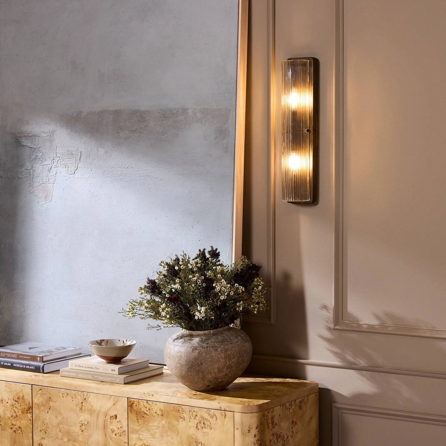 008 SI-2446595 | Lifestyle | Kenji Sconce by Four Hands in clear reeded glass, burnished brass iron, clear cord. Made from glass, iron, thermoplastic in a traditional style.