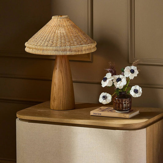 Canela Table Lamp by Four Hands in light oak, light raffia, aged brass. Made from solid oak, palm leaf, brass in a rustic style.
