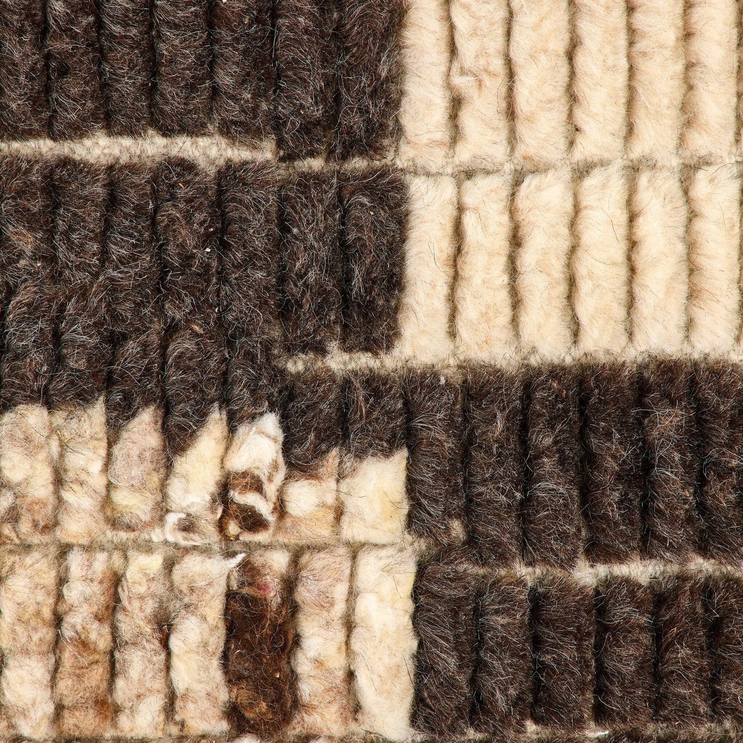 005 SI-2446599,SI-2446600,SI-2446601 | Closeup | Lagos Hand-Knotted Rug by Four Hands in lagos. Made from 100% wool in a unique style.