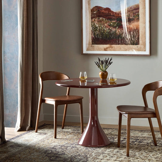 Vernon Dining Table by Four Hands in smooth red concrete. Made from solid concrete in a traditional style.