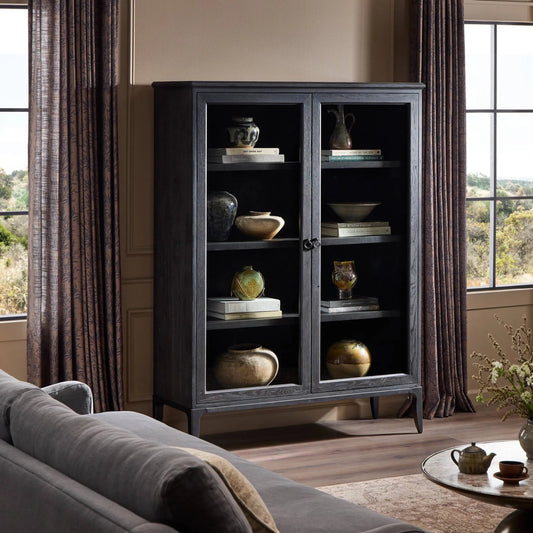 Alden Cabinet by Four Hands in worn black oak veneer, mottled gunmetal. Made from thick oak veneer, solid oak, iron in a traditional style.