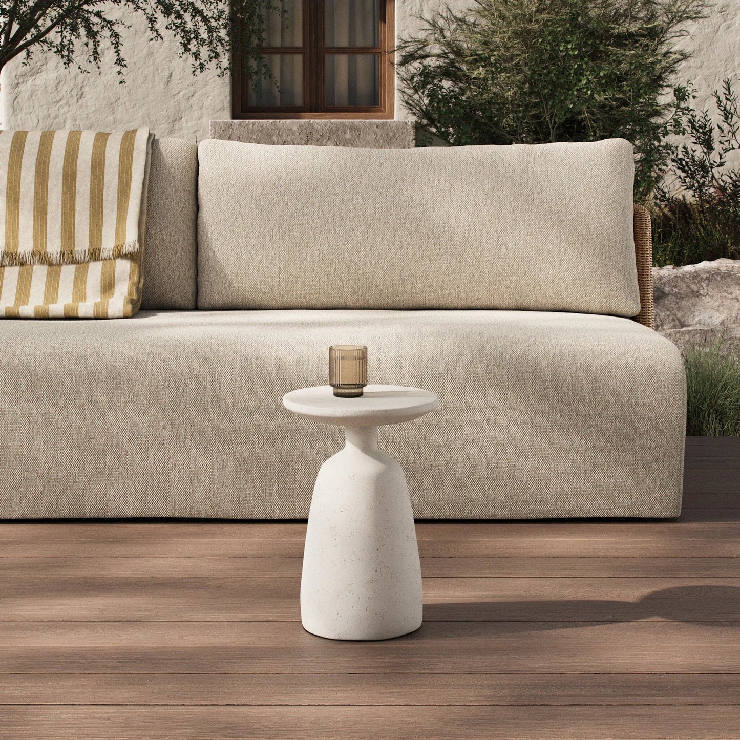 008 SI-2446642 | Lifestyle | Ramara Outdoor Nesting End Table by Four Hands in aged white concrete. Made from solid concrete in a transitional style.