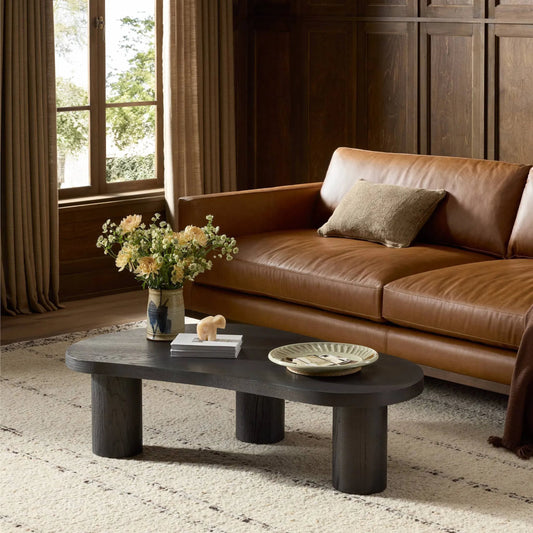 Joji Nesting Coffee Table by Four Hands in aged black, aged black oak solid, aged black maple veneer. Made from thick oak veneer, solid oak, light maple veneer in a unique style.
