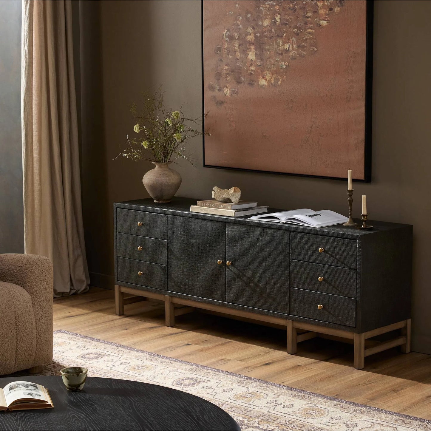 015 SI-2519172 | Lifestyle | Fiona Media Console by Four Hands in black raffia, russet mahogany. Made from sugar palm, solid mahogany in a transitional style.