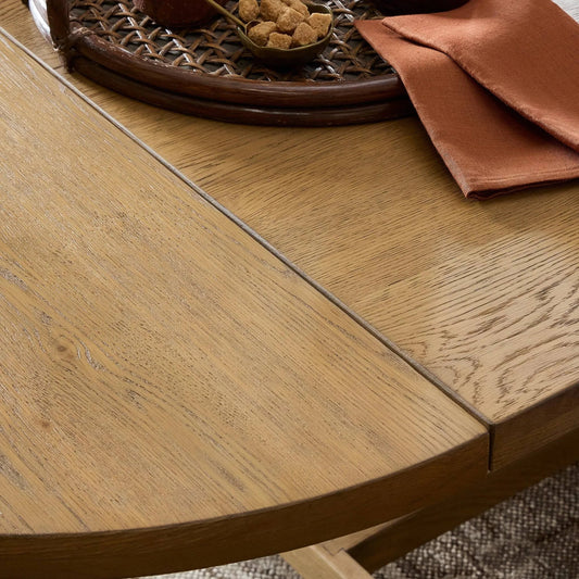 Blinn Oval Leaf Extension Dining Table by Four Hands in worn oak veneer. Made from oak veneer, solid oak in a transitional style.