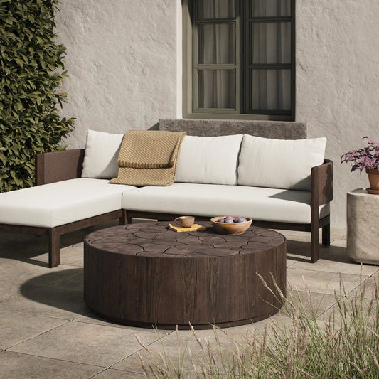 Ridge Outdoor Coffee Table by Four Hands in stained saddle brown-teak root. Made from solid teak in a unique style.