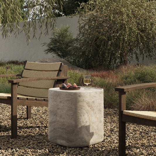 Manor Outdoor End Table by Four Hands in textured sandy grey. Made from solid concrete in a unique style.