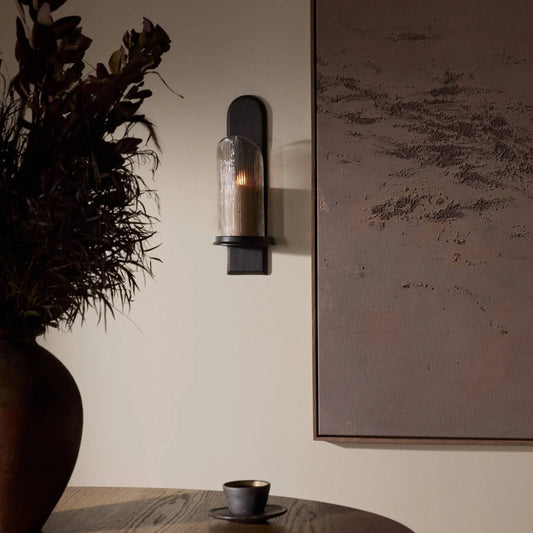 Elorie Wall Mounted Candle Holder Set by Four Hands in black antique, fluted glass. Made from aluminum, tempered glass in a unique style.