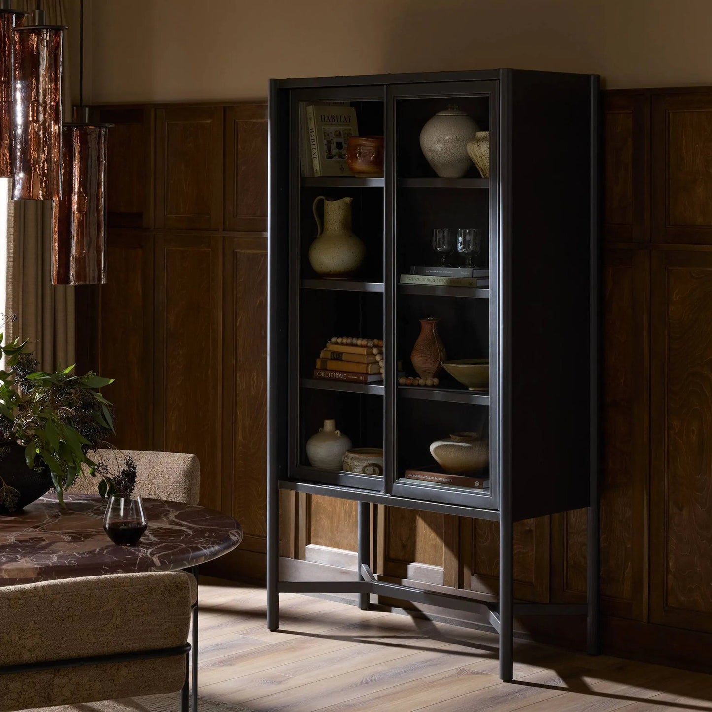 013 SI-2531699 | Lifestyle | Saxon Cabinet by Four Hands in brushed bronze patina, tempered glass. Made from iron, tempered glass in a unique style.
