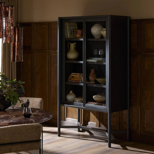 Saxon Cabinet by Four Hands in brushed bronze patina, tempered glass. Made from iron, tempered glass in a unique style.