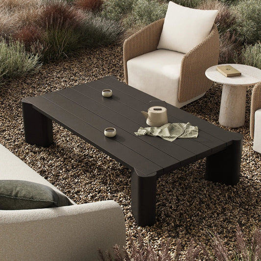 Soho Outdoor Metal Coffee Table by Four Hands in bronze. Made from aluminum in a unique style.
