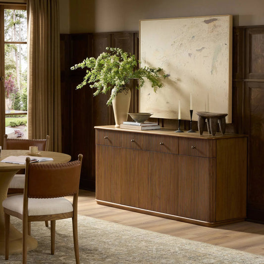 Ona Sideboard by Four Hands in amber mindi, amber mindi veneer. Made from solid mindi, mindi veneer in a unique style.
