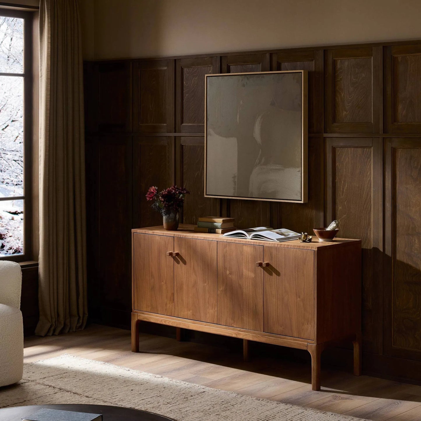 015 SI-2531577 | Lifestyle | Arturo 4 Door Sideboard by Four Hands in natural walnut, natural walnut veneer. Made from solid walnut, walnut veneer in a transitional style.